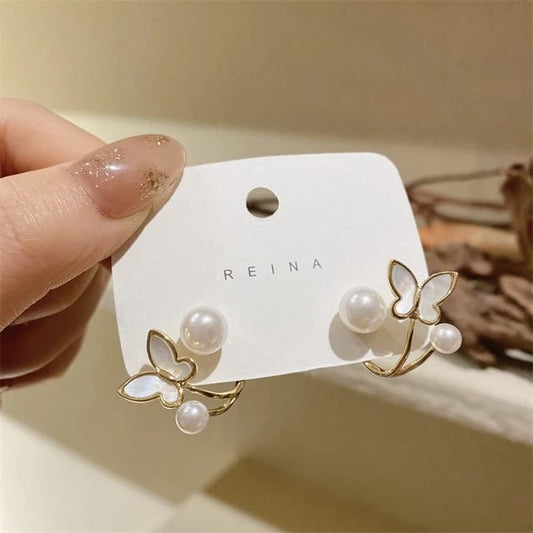 Butterfly Pearl Stud Earrings – Graceful & Elegant