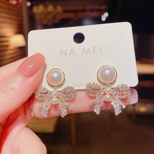 Luxury Crystal Bow Pearl Earrings – Glamorous & Chic