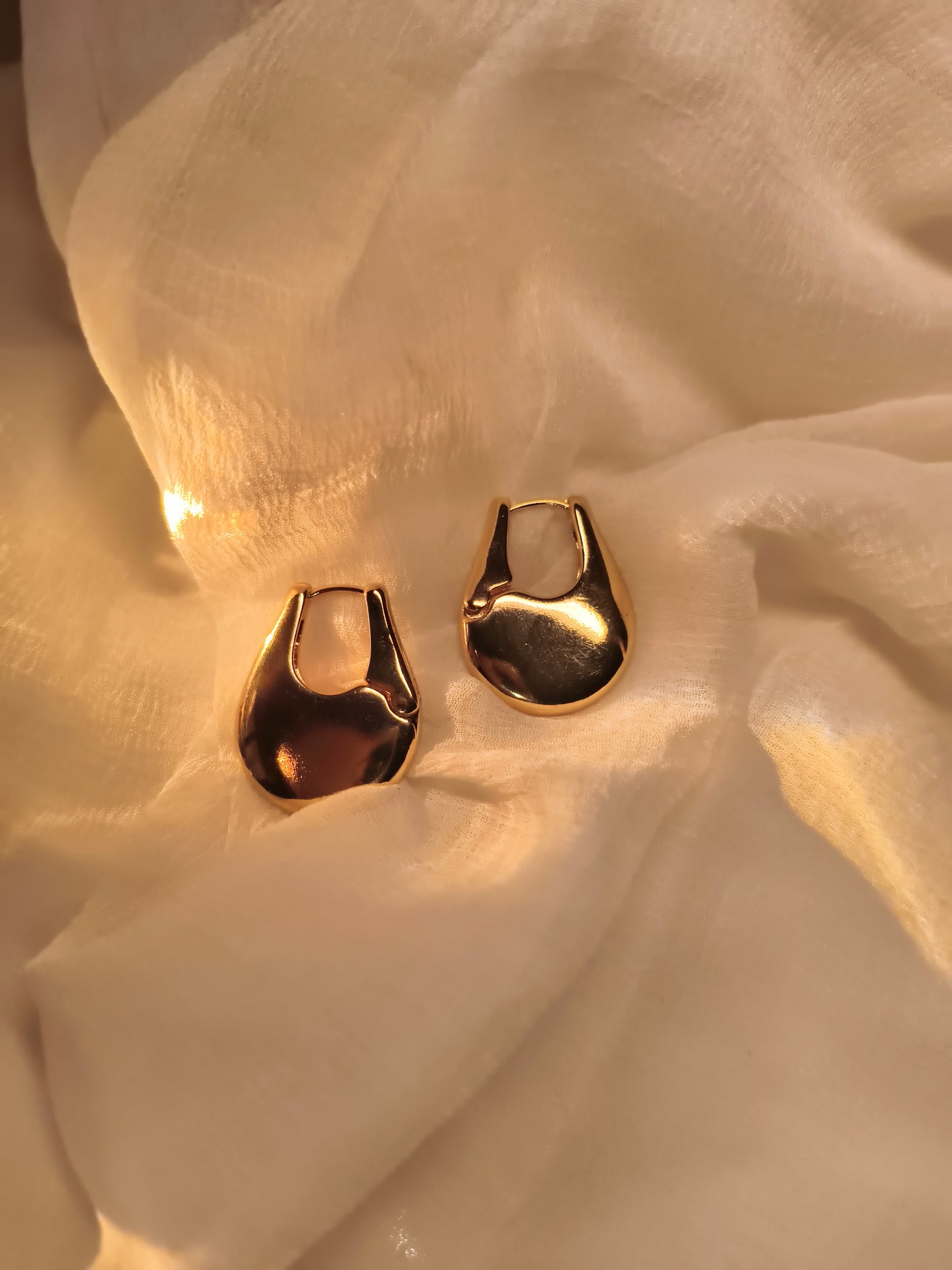 Golden Fluid Form Hoop Earrings – Minimalist Abstract Jewelry for Women